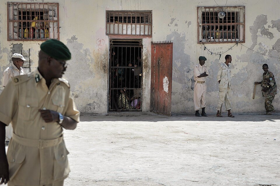 Guards outside a cell at Mogadishu Central Prison, December 2013