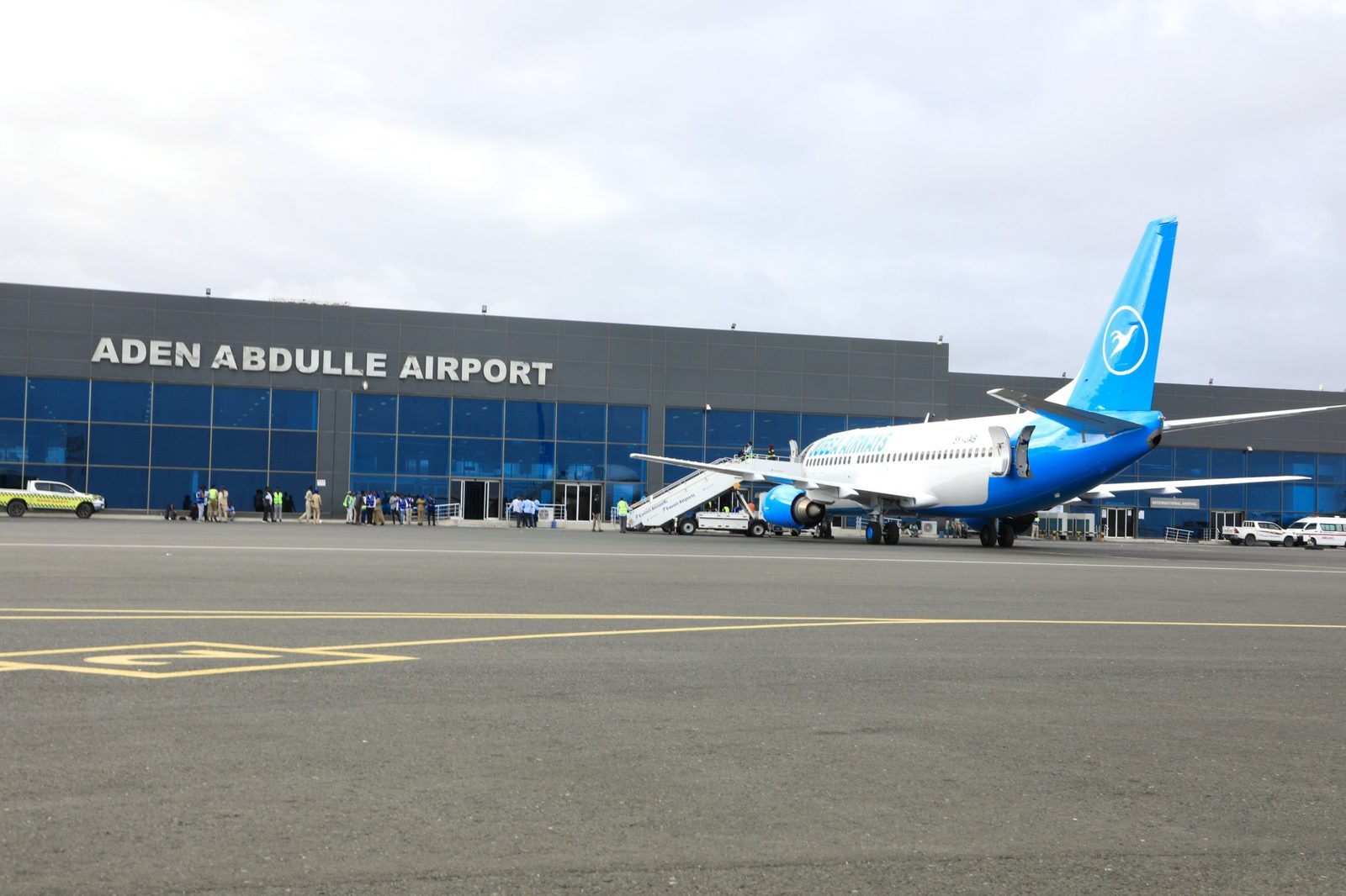 A passenger aircraft on the apron in front of the terminal at Aden Abdulle International Airport, Mogadishu